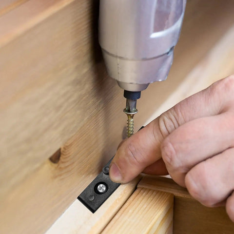 Rock Solid Adjustable False Front Cabinet Clamps For Seamless Drawer Alignment Heavy Duty Abs L Brackets being installed with a drill.