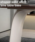 Close-up of the r-shaped solid wood frame table base of the Slick Oversized L Shaped Home Office Desk.