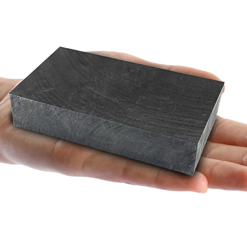Heavy Duty Graphite Ingot Block 100mm x 50mm x 25mm for milling surface melting and casting moulds with 99.9 percent purity held in hand