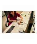 Woman connecting laptop to Beast Mode Thunderbolt 4 Docking Station With 280 Watt PD Fast Charging on a desk