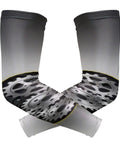 Skip Sunscreen Hassles With Dope Black Compression Arm Sleeves Built For Basketball Golf Players And Weekend Crews Craving Reliable UV Cover During Outdoor Drills Or Backyard Hangouts Featuring Grippy Elastic Bands For A Snug Fit And All Day Comfort. Compression arm sleeves with gear design for UV protection.