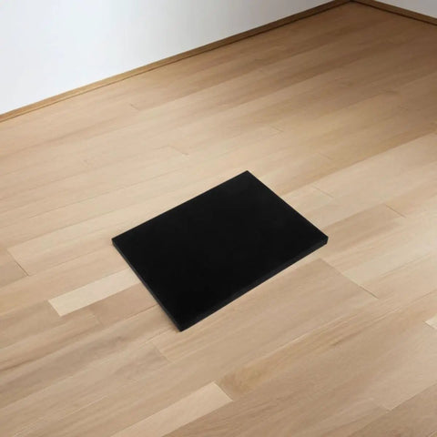 4 Pack Black Foam Sheets 405x305x25mm Cushioning Padding for Mailing shown on wooden floor