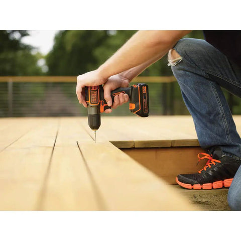Person using 20V Max PowerConnect Cordless Drill Driver With Autosense Technology for precise, flush screws in deck wood