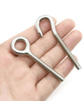 10Pcs M6 Stainless Steel Ring Eye Bolts Set With Welded Closed Eyes Rod Eye Screws Includes 20 Nuts And 40 Washers Beefy Heavy Duty Hoisting Gear For Lifting And Hanging In Home Workshop Farm Or Garage, two M6 stainless steel eye bolts in hand