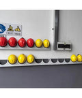 Heavy Duty Wall Mounted Safety Helmet Rack For Job Sites And Workshops Features Beefy Galvanized Steel And Cushioned Rubber Edges, displaying red and yellow hard hats.