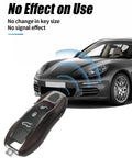 Marsala Red Leather Ride Ready Key Fob Cover For Porsche Macan Panamera 911 Cayenne 718 Cayman Boxster with car in background