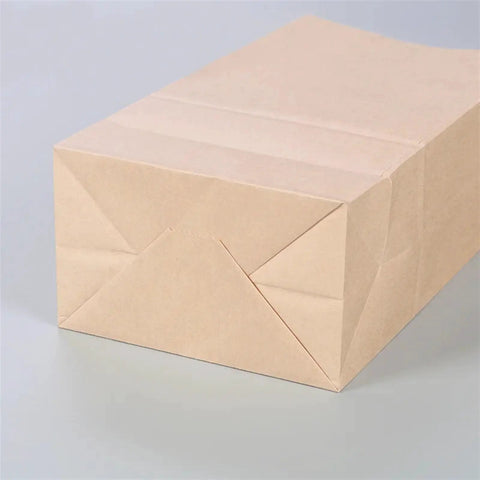 Close-up of Kraft Paper Bags Khaki Party Favor Bags Set Of 50 Or 100 Pcs In 28x28x14 Cm Eco Friendly Gift Bags Durable Reusable