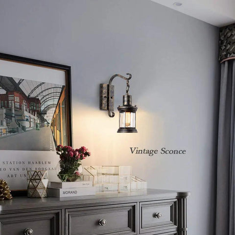 Rustic Lantern Wall Sconce Lights Plug In Oil Rubbed Bronze Antique Fixtures, mounted above a dresser in a bedroom.
