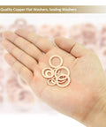 Hand holding copper sealing washers from Copper Sealing Washers Kit, Kindroufly 320 Pieces, 11 Metric Sizes M5 To M20.