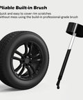 Black Rim Touch Up Paint Kit For Cars With Brush Quick Wheel Scratch Repair Automotive Rim Paint For Curb Rash And Surface Damage Easy DIY Rim Repair 1 Oz 30 Ml next to a black tire wheel