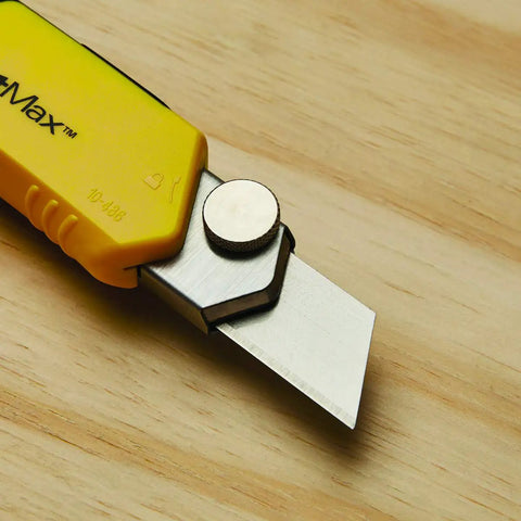 FatMax Snap Off Knife Durable Utility Knife with 25mm blade, ergonomic yellow grip, shown on wooden surface