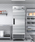 Pro Grade 23 Cubic Foot Commercial Reach In Refrigerator With Heavy Duty Stainless Steel Exterior in restaurant kitchen.