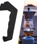 Moka Pot Handle Replacement For 1 To 12 Cup Stovetop Espresso Pots, black plastic handle next to brewing pot on stove
