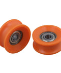 Top Shelf 4 Piece U Groove Pom Pulley Pack Featuring A Clean 6 mm Bore And 30 mm Rim Built Tough For 79 Kg Load Capacity And Slick Fast Spin On Any Hardworking DIY Assembly Project, showing two orange pulleys with sealed steel bearings.