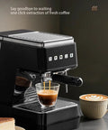 Compact Semi Automatic Espresso Coffee Maker With Built In Steam Wand For Lattes And Cappuccinos, brewing espresso with glass cup.