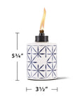 Single Tie Dye Glass Tabletop Torch with flame, 5.75 Inch tall, for outdoor patio, backyard, and garden lighting.