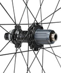 Dura-Ace R9270 C50 Carbon Road Wheelset, 50mm Tubeless Deep Rim, 700c Centerlock Disc hub detail with spokes in close-up view
