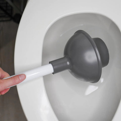 Heavy Duty Toilet Plunger With Extended Flange And Portable Caddy in toilet, gray cup, white handle for stubborn clogs.