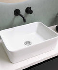 White rectangular sink with black faucet, features two pack stainless steel bathtub drain strainers with deep basket design hair catcher.