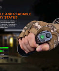 Gloved hand holding Beast Mode 5000 Lumen Flashlight With 437 Yard Throw, power indicators visible, tactical setting demonstration