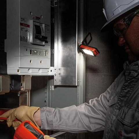 Go To Rechargeable LED Work Light With Kickstand in use by technician near electrical panel