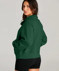 Back view of Womens Half Zip Cropped Fleece Pullover Hoodie Sweatshirt In Dark Green showing relaxed fit and cozy fabric