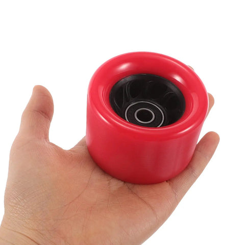 Person holding Red 92A Quad Roller Skate Wheels Durable Indoor Outdoor Replacement Anti Slip PU PP Grippy Wheels For Speed Skating And Roller