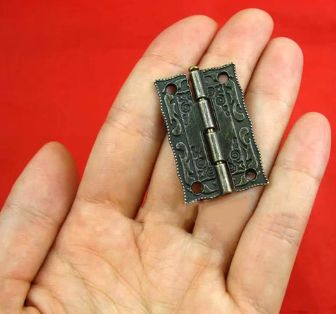 Antique Bronze Small Hinges Set 2 Pcs Engraved Decorative Hinges for Wooden Boxes Jewelry Boxes Dollhouses held in hand