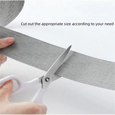 Extra Wide Window Screen Repair Tape 4 By 16.4 Feet Black Adhesive Waterproof Three Layer Fiberglass Patch being cut to size