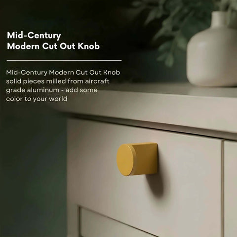 Top Shelf Aluminum Mid Century Modern Cabinet Knob Featuring Fresh Sunflower Yellow Matte Finish And Tight Ergonomic Cutout Design For Kitchen Drawers Bathroom Cabinets Or Furniture on a drawer.