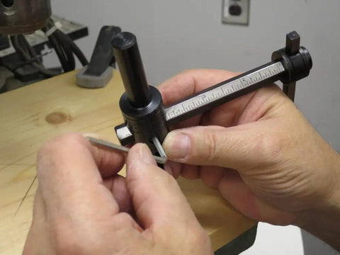 Heavy Duty Circle Cutter For Drill Press in use, adjusting from 1 3/4 to 7 7/8 inches, tempered steel body with graduations, half inch shank.