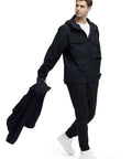 Man in 3 in 1 Waterproof Winter Ski Jacket For Men With Fleece Liner Hood Black XL Built To Handle Rain Snow And Cold, carrying jacket
