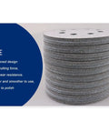 Stack of 5 inch sanding discs with multiple holes for hook and loop design, made from durable corundum paper.