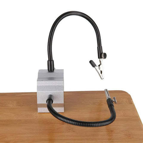 Beefy Flexible Metal Arm Soldering Clamp With Adjustable Multi Angle Stand for Electronics PCB DIY Projects on wooden surface