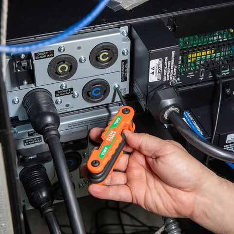 Using Compact Folding Hex Key Set With 25 Sizes In Metric And SAE Plus Torx Keys for electrical panel maintenance