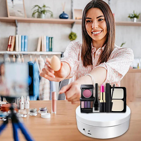 Herxsin Electric Rotating Display Stand 360 Degree Motorized Turntable With Usb Power Cable showcasing makeup tools on a white finish platform.
