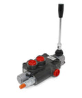 Side view of monoblock hydraulic directional control valve with lever and red port plugs.