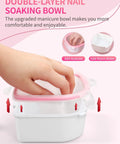 Hand using Two Pack Nail Soak Off Bowl Kit For Gel Polish Remover And Dip Powder, Includes 2 Bowls, Triangle Cuticle Peeler, Stainless Steel Cuticle Pusher, Pro Grade Nail Art Tools, Pink with double-layer bowl design