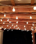 25Ft LED String Lights With 27 Shatterproof Clear Globe Bulbs Dimmable And Energy Efficient Connectable on wooden pergola
