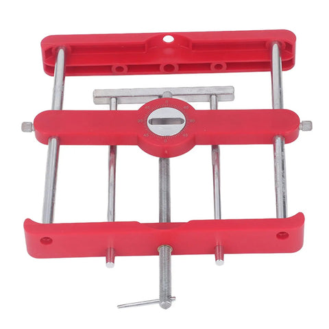 Precision Woodworking Mortise And Tenon Jig With Self Centering Loose Tenon Doweling Kit showing red ABS housing and steel rods.