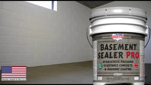 Super Slick Basement Sealer White 5 Gallon in a basement with smooth white walls, offering high hydrostatic pressure resistance.