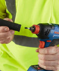 Man using 18V Brushless Dual Mode Impact Driver And Wrench With 1800 In Lbs Torque And 4200 IPM Two In One Hex Shank Power Groove