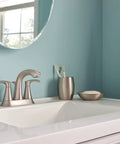 Graeden Two Handle Four Inch Centerset Bathroom Faucet in Spot Resist Brushed Nickel on modern white sink