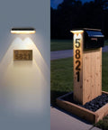 Heavy Duty Solar Wall Lights Outdoor Waterproof For Fence Or Mailbox Or Address Sign Offering Three Light Modes With Warm Daylight And Cool White Colors Using Wide Angle Focus Lens Delivering Kickass Yard Illumination illuminating mailbox and house number 5821.
