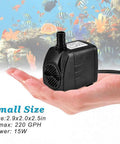 Whisper Quiet Submersible Fountain Pump 220 GPH held in hand with colorful aquarium backdrop