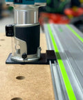Killer Precision Router Guide Rail Adapter For Makita Tools mounted on track with aluminum stops for accurate cuts.