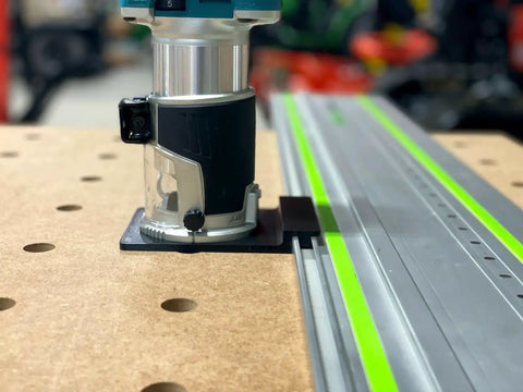 Killer Precision Router Guide Rail Adapter For Makita Tools mounted on track with aluminum stops for accurate cuts.