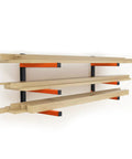 2 Pack Lumber Rack Wood Organizer and Wall Mount Shelf System with 3 Levels Heavy Duty Orange Metal Storage Racks for Indoor Outdoor Use Built To Last Holds Up To 600 Lbs Per Shelf showing stacked wooden planks