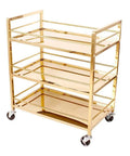 Heavy Duty Metal Serving Cart With Three Roomy Shelves And Slick Rolling Casters For Kitchen Organization Or Chill Bar Setup No Fuss Saves Floor Space Anywhere At Home Or Local Venue in gold finish.