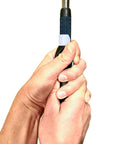 Hands gripping a club using the Left Handed Golf Grip Trainer Golf Swing Aid Attachment To Correct Hand Placement And Grip For Pro Style Setup Easy Practice Tool For Consistency Quick Grip Correction And Smarter Swing Mechanics.